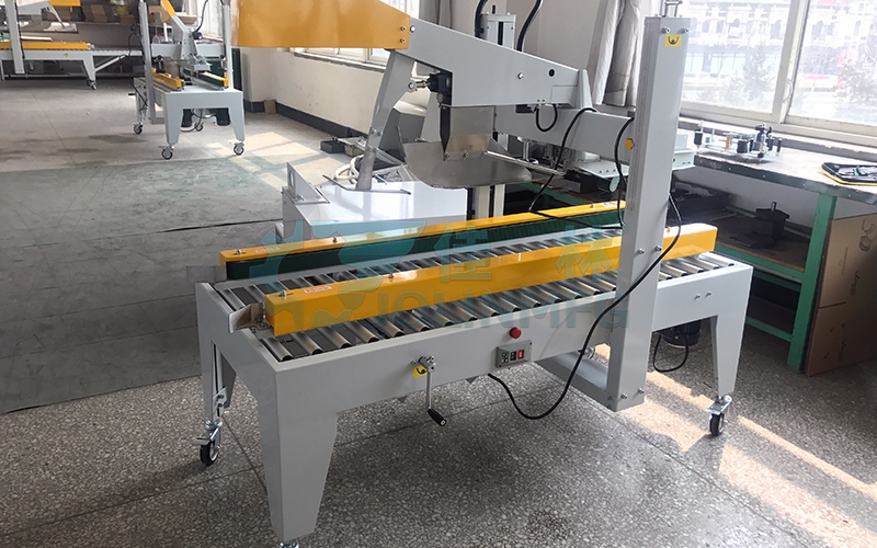 自動(dòng)折蓋封箱機(jī)